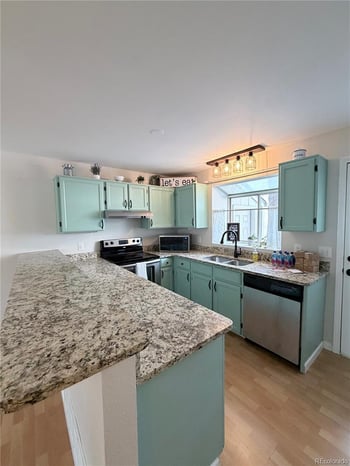 9709 W Chatfield Ave #E, Littleton, CO 80128