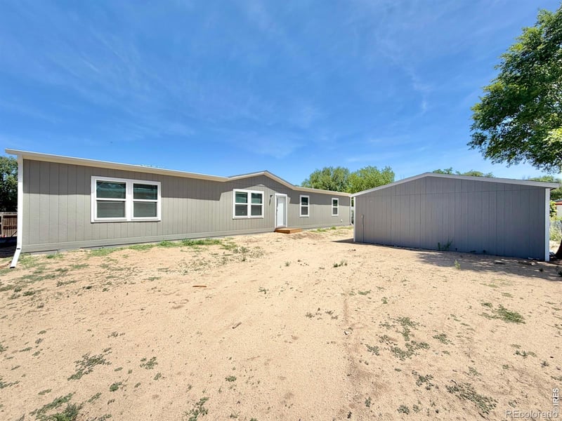 103 Beach Dr, Log Lane Village, CO 80705