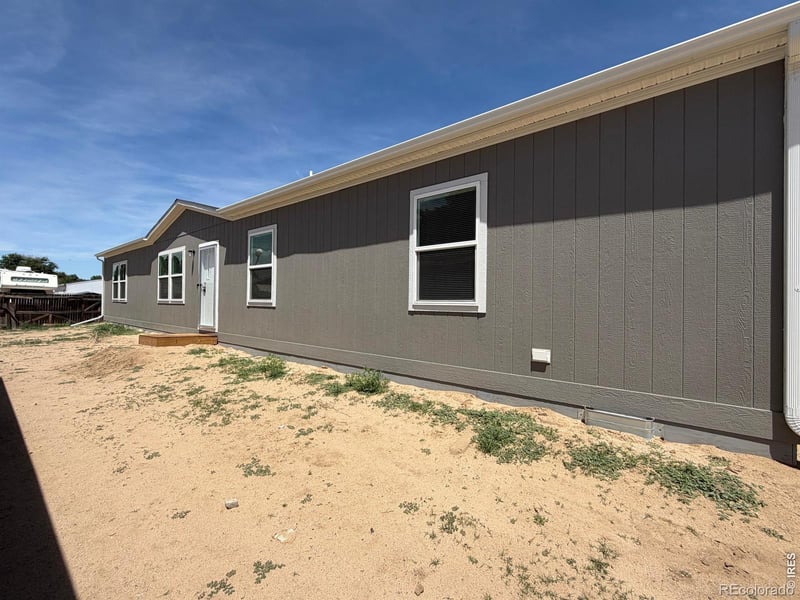 103 Beach Dr, Log Lane Village, CO 80705