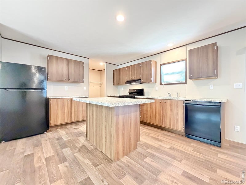 103 Beach Dr, Log Lane Village, CO 80705