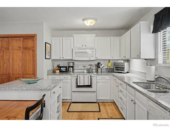 717 Shipman Mountain Ct, Windsor, CO 80550