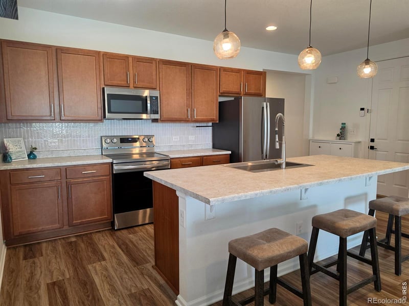937 Eva Peak Dr, Erie, CO 80516