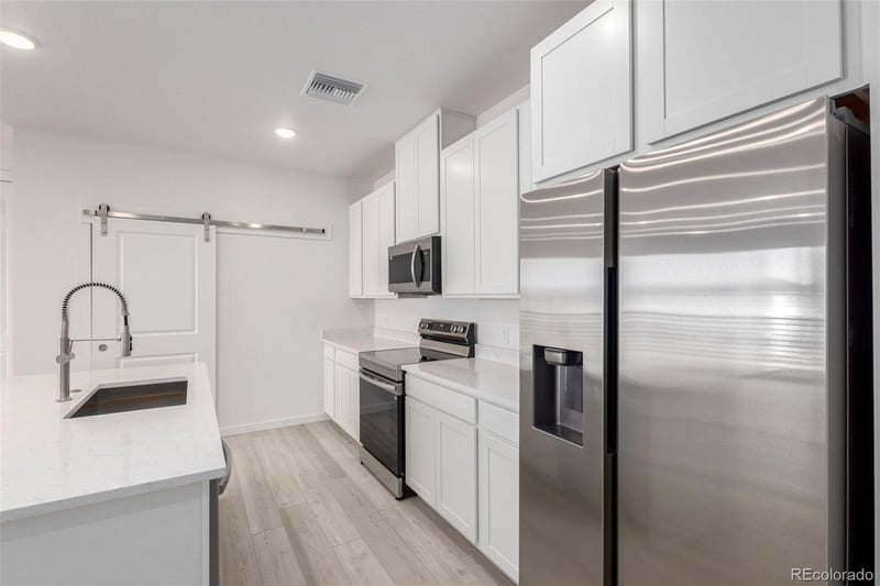 6153 N Ceylon St #1, Denver, CO 80249