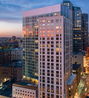 The Kensington apartment tower at dusk