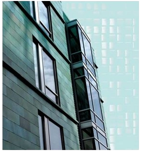 Legacy exterior image of Loft23 showing its metal facade and projecting windows