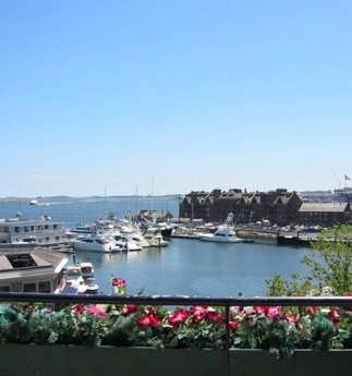 Legacy photograph of Boston Harbor and marina from the Christopher Columbus Plaza guide
