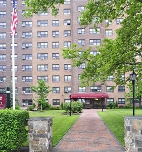 Carson Tower entrance and brick exterior at 1410 Columbia Road