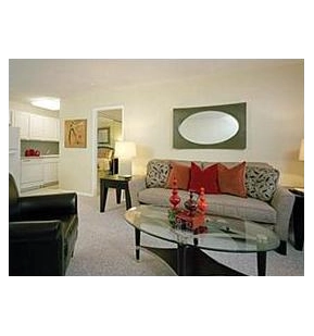 Legacy furnished living-room photograph from the Dexter Park guide