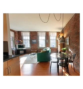 Example brick-and-beam interior from the original 26 Stillman Street guide