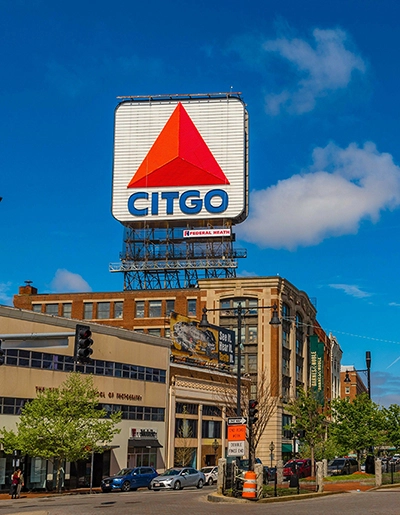 CITGO sign above brick buildings and a streetscape.