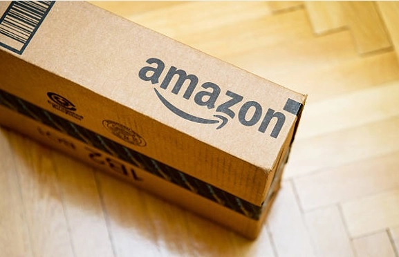 Amazon-branded cardboard shipping box.