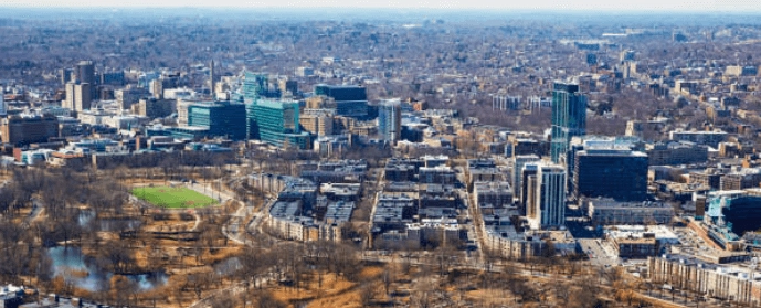 Buildings and playing field in the Fenway lab-space guide photograph