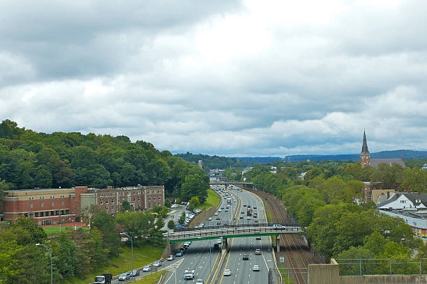 Highway, bridge and nearby buildings in the source policy article
