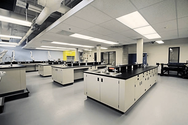 Laboratory benches beneath ceiling services and lighting
