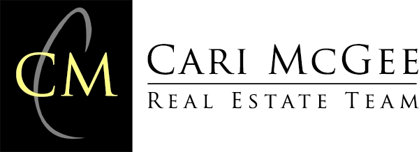 Cari McGee Real Estate Team logo with badges for two Tri-Cities Best Real Estate Team honors