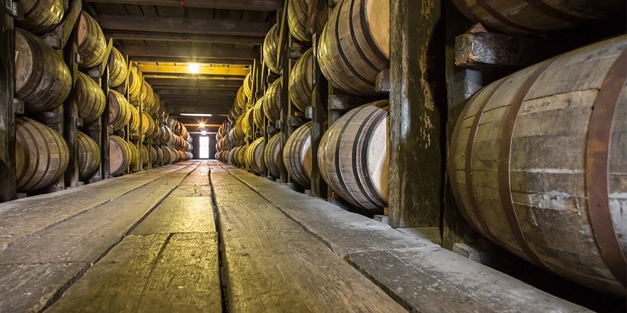warehouse full of bourbon barrels
