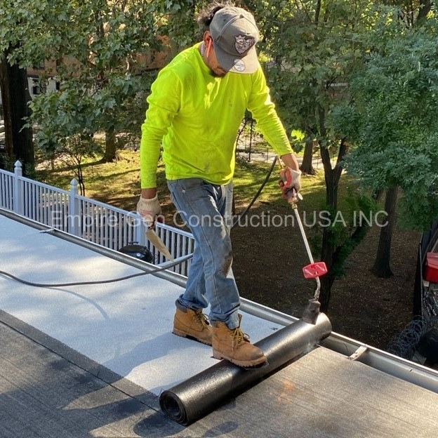 Flat Roof and Masonry Solutions by Empire Gen Construction Inc.