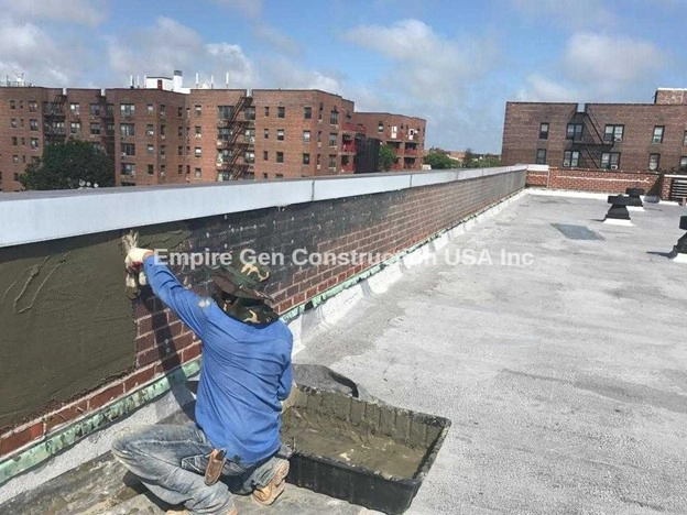 Flat Roof and Masonry Solutions by Empire Gen Construction Inc