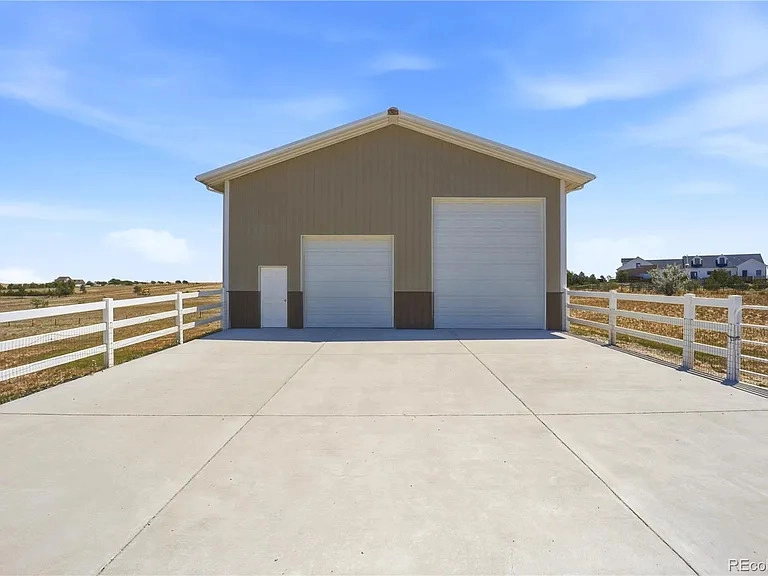 Barn, loafing shed, and detached garage at 35880 E 149th Court