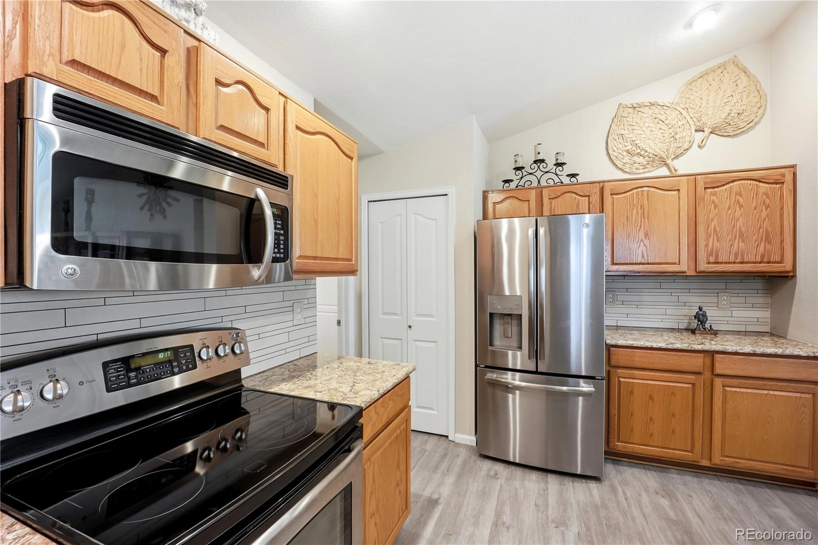 Kitchen: granite, stainless, pantry