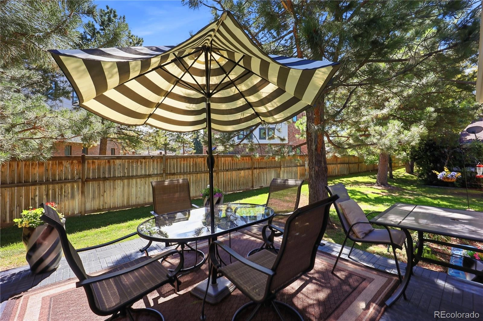 Patio under the pines, backing to greenbelt