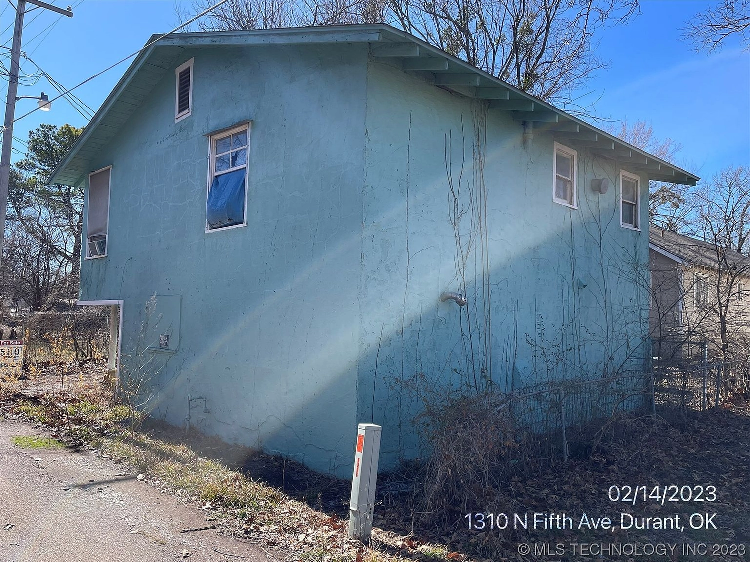 Side of house at 1318 N 5th Avenue #1/2, Durant OK