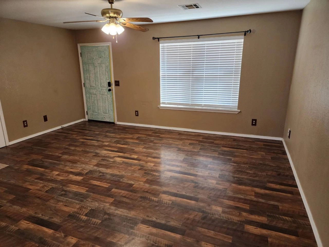 Living area with ceiling fan at 3177 Rock House Rd, Bennington, OK