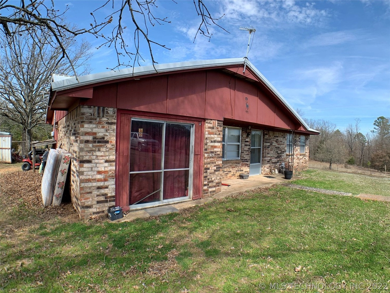 9675 S Cold Springs Road Atoka OK - side of house