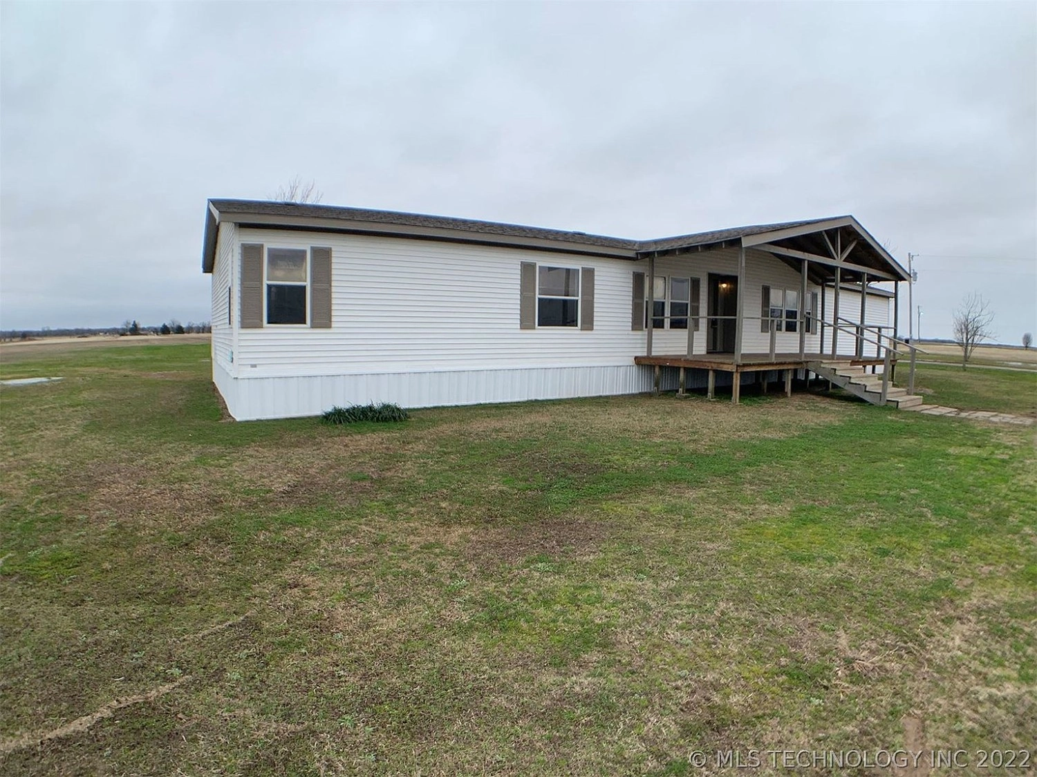 136 Ford Road Calera OK - Side view