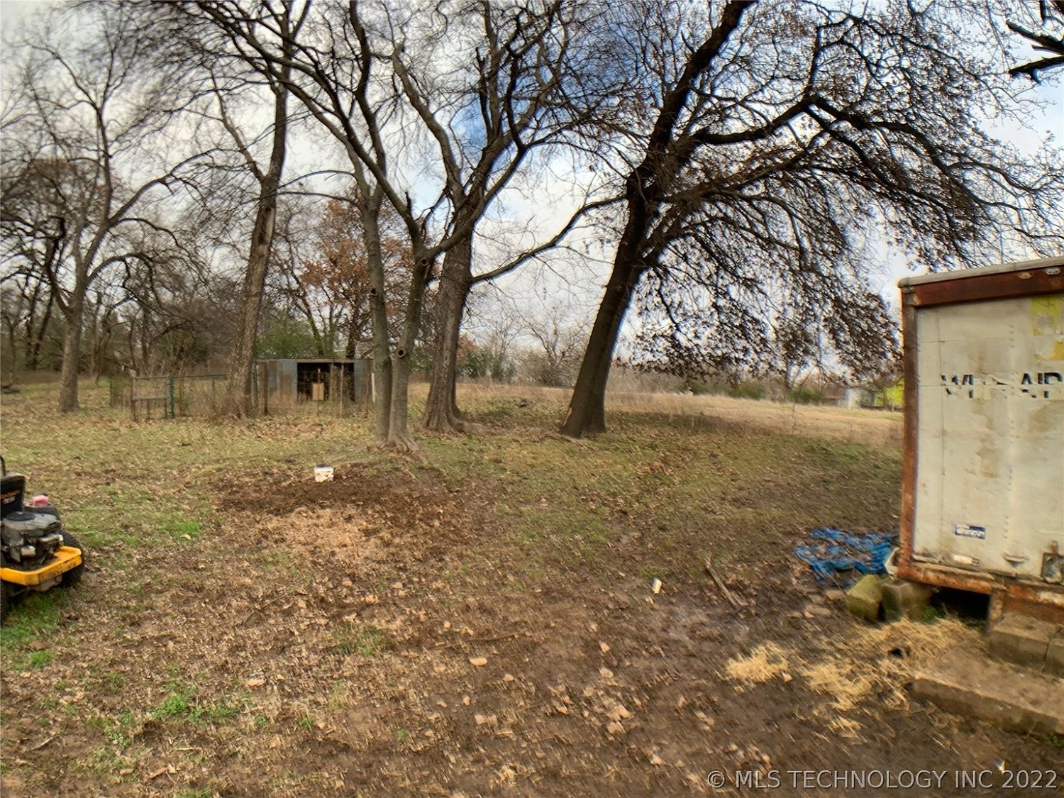 1318 Hillcrest Drive Durant OK - Backyard trees