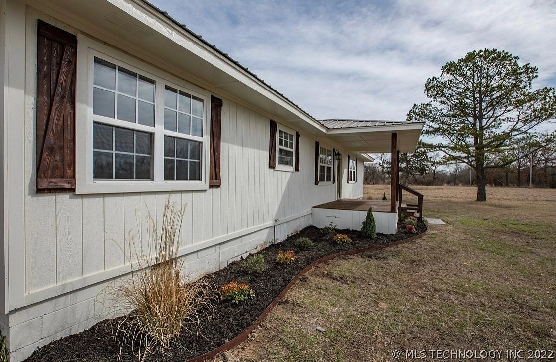 6165 W Hardesty Road Caney OK - Side of home