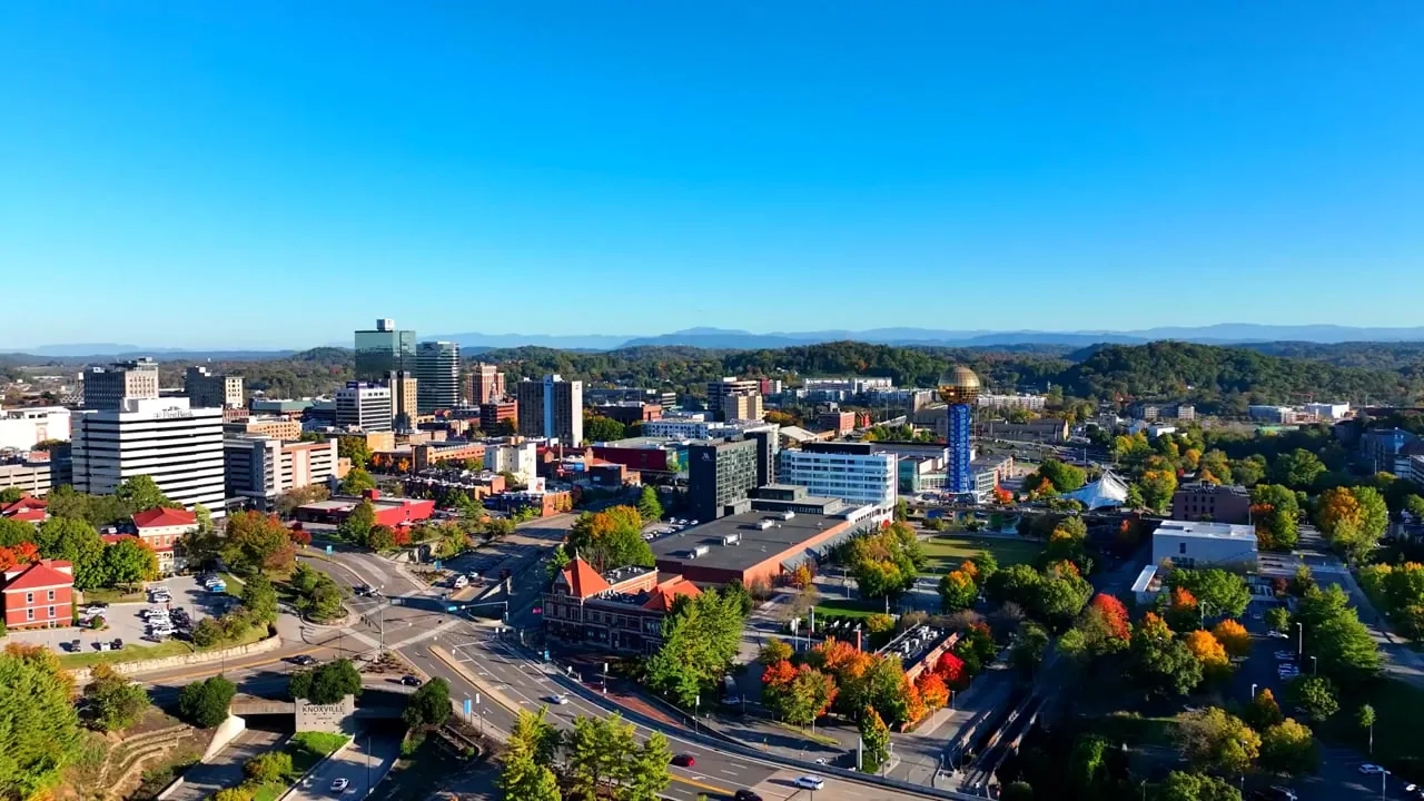 Downtown Knoxville and the Sunsphere, with East Tennessee hills on the horizon