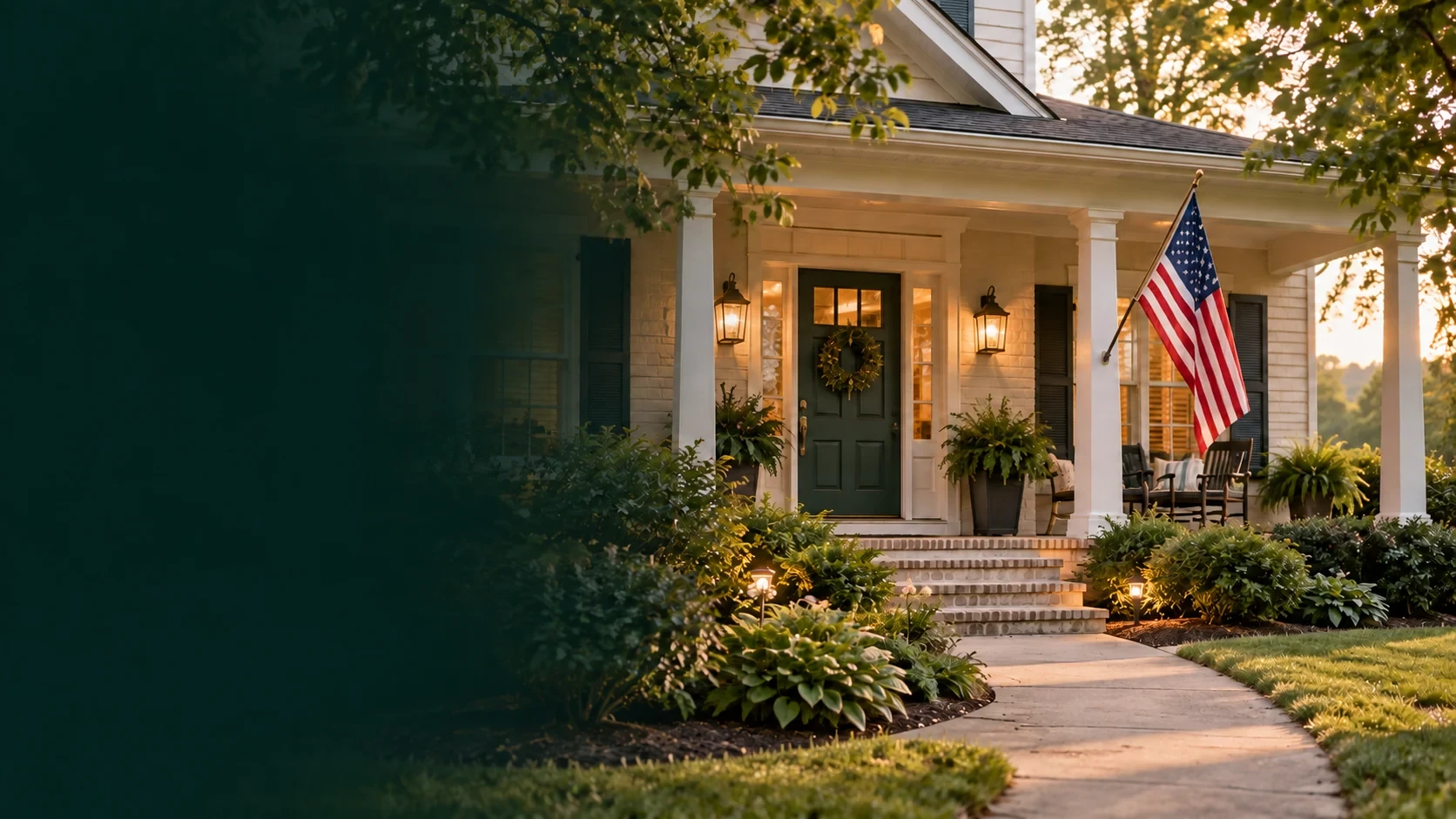 Illustrative home with a green front door and an American flag on the porch