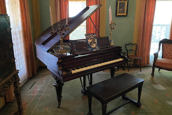 Overholser Mansion 3 Photo of the piano inside the sitting room in the Overholser Mansion