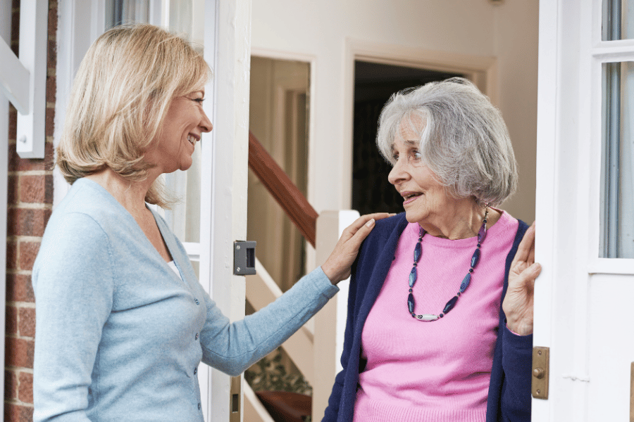 Two neighbors talking and having good conversation