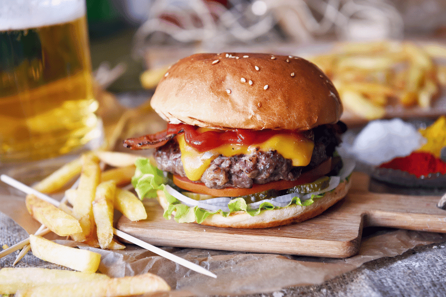 Order a Delicious burger and fries at Bad Daddy's Burger Bar in Morrisville, NC