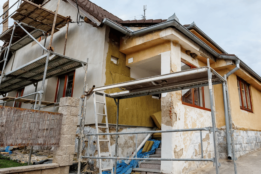 Construction on a fixer-upper house on the outside