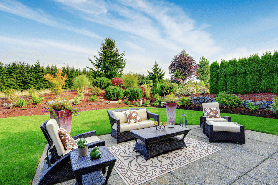 Green grass and beautiful backyard patio setup