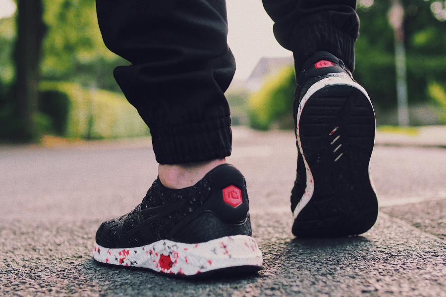 resident wearing new walking shoes in neighborhood