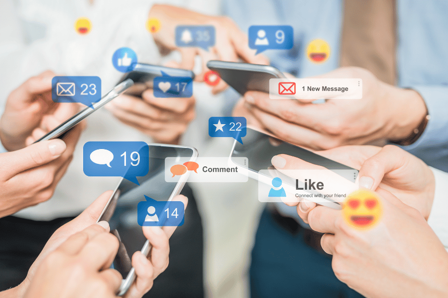 Group of people using social media on their phones