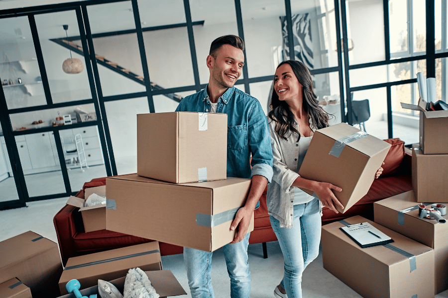 young couple moving into their new home 