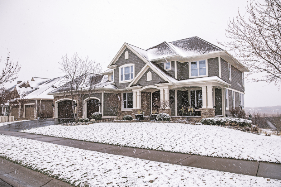 Family Home in the winter with snow