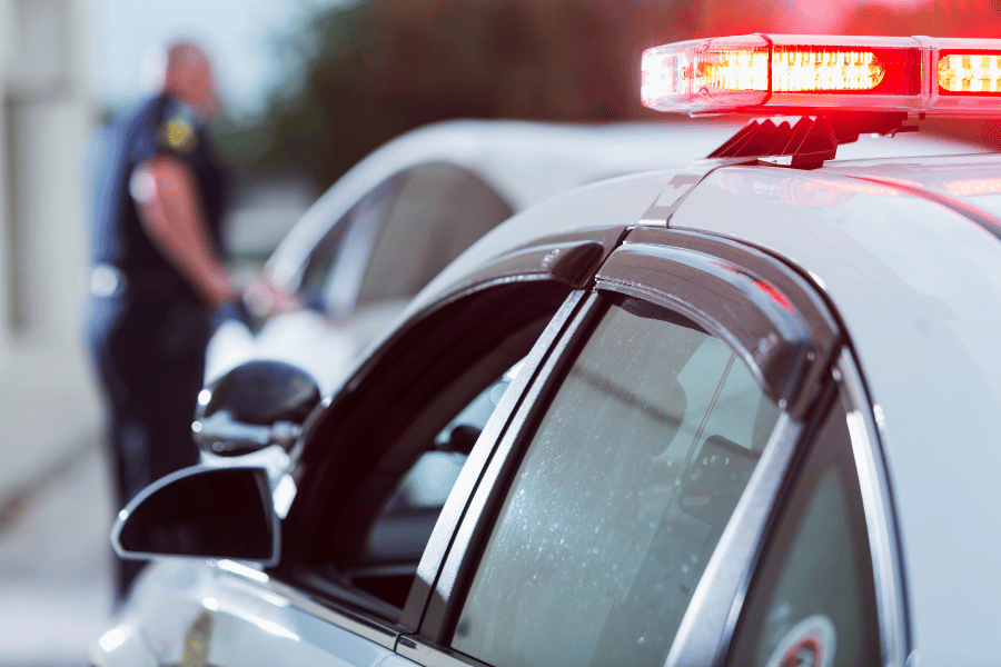 police cars parked with the lights on 