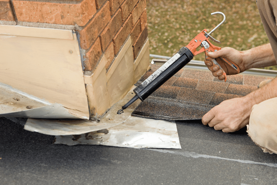 fixing the chimney flashing and the roof around it 