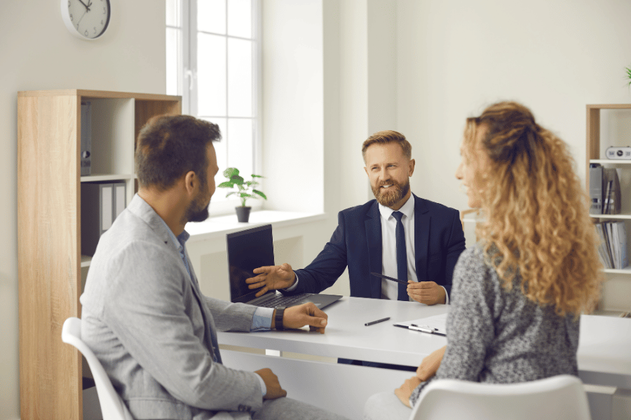 couple discussing purchasing mortgage insurance 