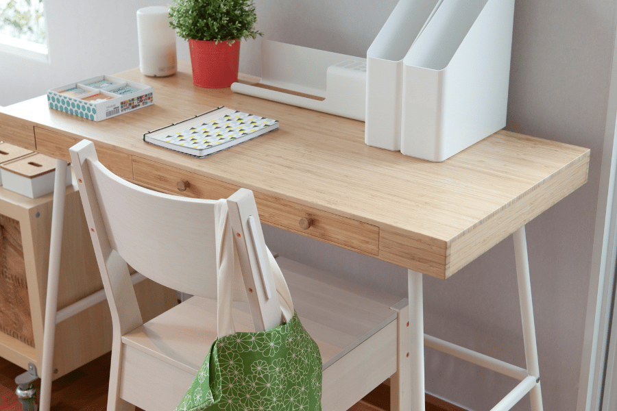 small desk and chair in a guest bedroom so that guest can work 