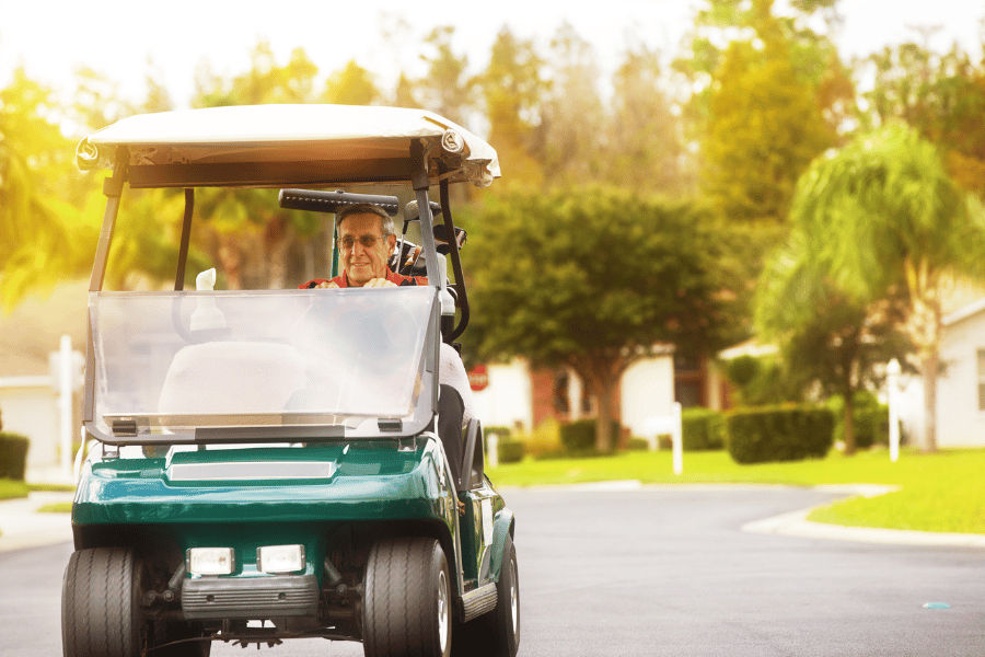 Pinehurst golf community - Retiree driving cart