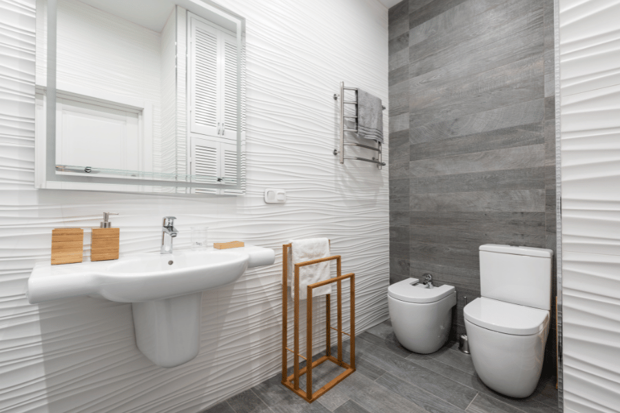 Large bathroom with an updated toilet and sink 