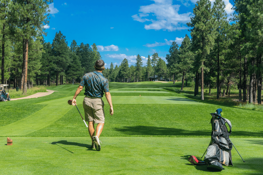Golfer playing on course