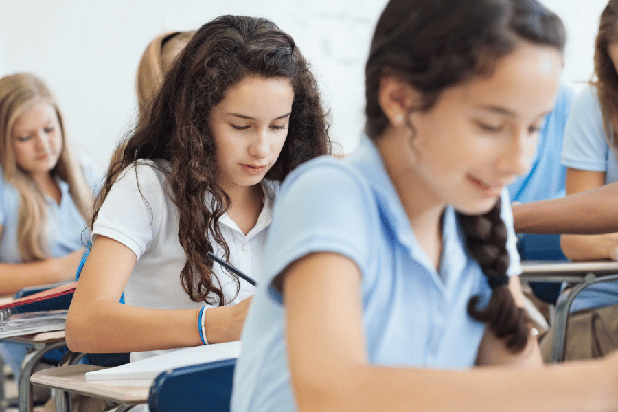Private school children learning in the classroom